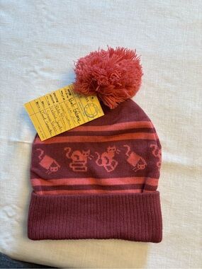 Out of Print Rose Red Pom-Pom beanie with Cat Motif